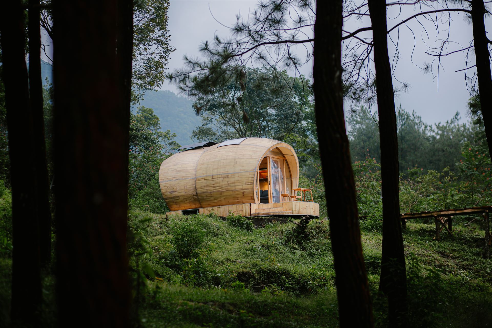 Close-up of Kiwari Suuk prefabricated curved bamboo roofing shingles