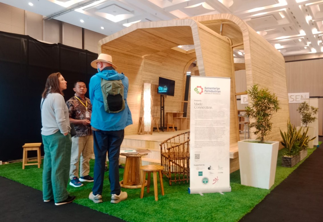 Minimalist commercial exhibition booth pavilion built with engineered bamboo panels